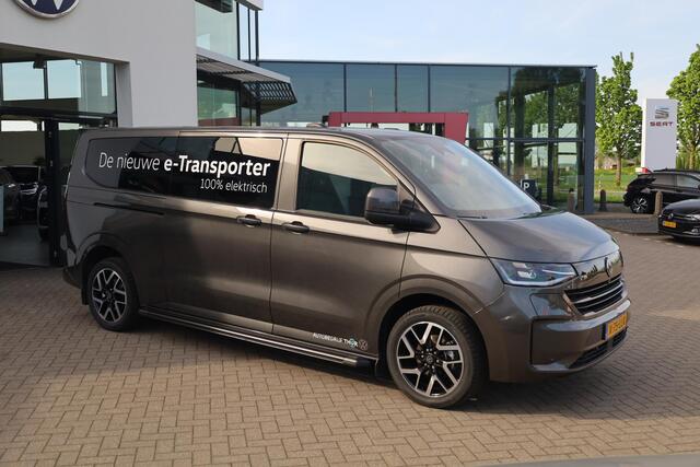 Volkswagen E-Transporter 32 L2H1 Bulli 64 kWh 286PK / 210kW, Achteruitrijcamera (Area View), LED Matrix IQ.Light, verwarmbare voorstoelen, Apple Carplay & Android Auto, achteruitrijcamera, adaptive cruise control met Stop & Go, navigatie, dynamische grootlichtassistent, volledig