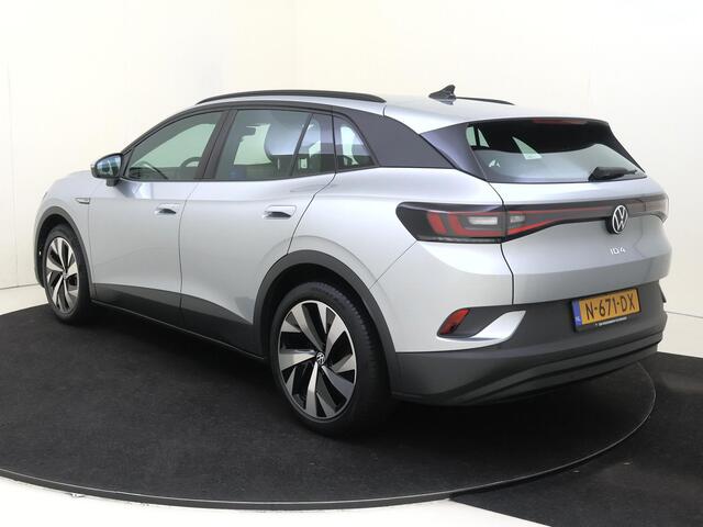 Volkswagen ID.4 Life 77 kWh | Navigatie | Adaptieve cruise control | Stoelverwarming | Parkeersensoren | CarPlay | Elektrisch inklapbare buitenspiegels | Voorklimatisering |