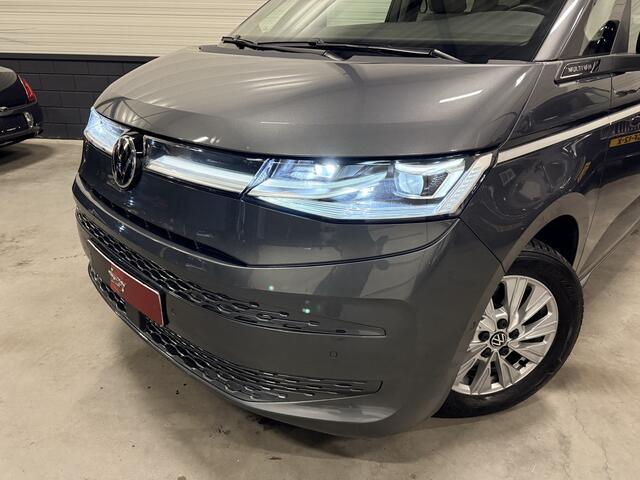 Volkswagen MULTIVAN 1.4 eHybrid Style 7p. LEER-ALCANTARA/TREKHAAK/IQ-LIGHT/EL.SCUIFDEUREN/SFEER/NAVI/CARPLAY/ADAPTIVE CRUISE/CHROOMSTRIP EXTERIEUR/PRIVACY/INDIUMGRAU-METALLIC/BOUWJAAR 04-2023/BTW-AUTO, PRIJS IS INCL. BTW