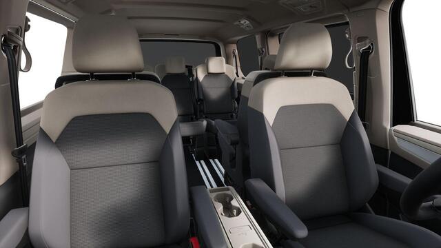 Volkswagen MULTIVAN Bulli L2 1.5 Ehybrid 180kW 245 pk DSG 4 motion | Versterkte kunststof vloerbedekking in houtlook | Multifunctionele verschuifbare tafel in passagiersruimte | Navigatiesysteem '' Discover Pro'' | Privacy Plus glas (90%) vanaf B-stijl |