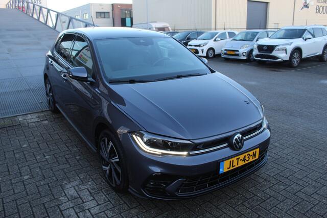 Volkswagen POLO 1.0 TSI 2x R-Line Automaat Navigatie/Virtual cockpit/Adaptive cruise control/Achteruitrijcamera/Parkeersensoren rondom/Apple carplay/Stoelverwarming/LED grill/IQ.light/Climate control/Draadloze telefoonlader/DAB/17''Lichtmetalen velgen.