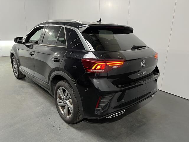 Volkswagen T-Roc 1.5 TSI R-Line / AUTOMAAT/ FABRIEKSGARANTIE T/M 2-2027/ TREKHAAK AFNEEMBAAR/ ADAPT. CRUISE/ MATRIX/ NAVI/ APP-CONNECT/ RIJ-MODI/ STOEL VERWARM./ PARK. SENSOREN + CAMERA