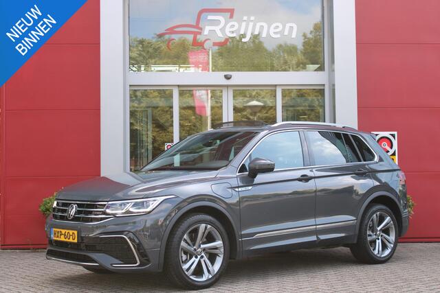 Volkswagen TIGUAN 1.4 TSI 245PK eHybrid R-LINE BUSINESS + | PANORAMISCH SCHUIF/KANTEL DAK | ELEKTRISCH WEGKLAPENBARE TREKHAAK | R-LINE INTERIEUR/EXTERIEUR | VERWARMBARE VOORSTOELEN/STUUR | ELEKTRISCH BEDIENBARE VOORSTOELEN MET GEHEUGEN FUNCTIE | AKOESTISCH GLAS GETINT | KE