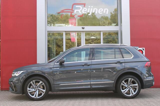 Volkswagen TIGUAN 1.4 TSI 245PK eHybrid R-LINE BUSINESS + | PANORAMISCH SCHUIF/KANTEL DAK | ELEKTRISCH WEGKLAPENBARE TREKHAAK | R-LINE INTERIEUR/EXTERIEUR | VERWARMBARE VOORSTOELEN/STUUR | ELEKTRISCH BEDIENBARE VOORSTOELEN MET GEHEUGEN FUNCTIE | AKOESTISCH GLAS GETINT | KE