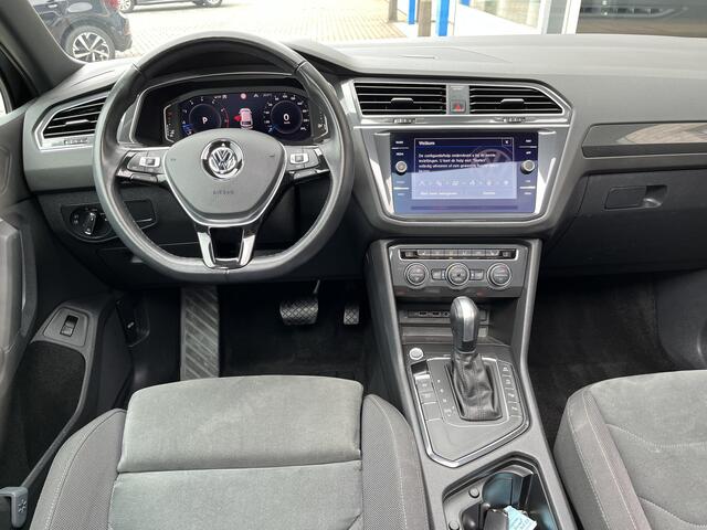 Volkswagen TIGUAN 1.5 TSI ACT R-Line / AUTOMAAT/ PANO/ CAMERA/ PARK. SENSOREN/ LED/ DODE HOEK/ DAB/ MASSAGE FUNCTIE/ CLIMA/ ELEK. ACHTERKLEP/ APP-CONNECT/ STOEL VERWARM/ ACC/ NAVI/ KEYLESS/ ISOFIX/ 19" LMV