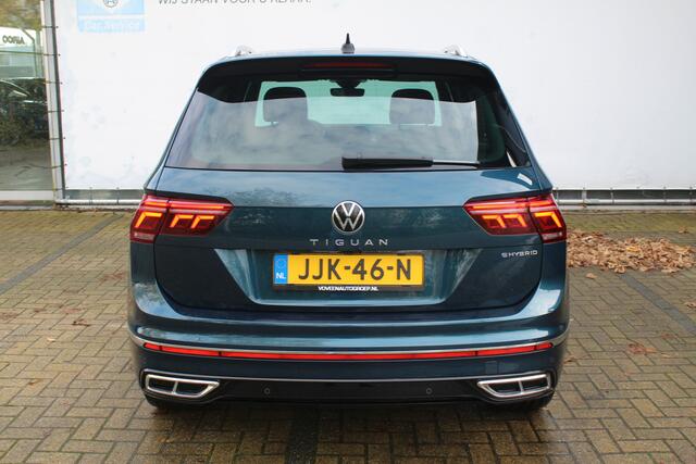 Volkswagen TIGUAN 1.4 TSI eHybrid R-Line Business+ | Incl. 12 maanden Garantie | Panorama dak | Memory stand stoelen | Stoel & Stuurverwarming | 360* Camera | Climate controle | Adaptive cruise | Elektrische kofferbakklep | Dodehoek detectie | IQ. Lights | Keyless entry/st