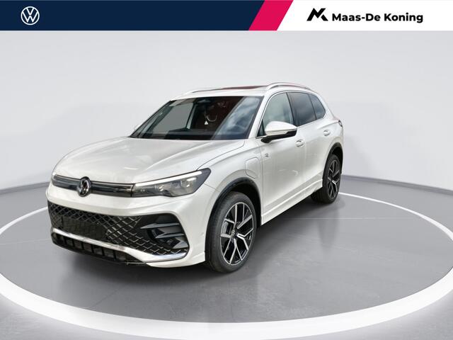 Volkswagen TIGUAN 1.5 eHybrid 272pk DSG R-Line Edition · Panoramadak · Camera · Stuur- & Stoelverwarming · Inklap. Trekhaak · Massagefunctie Bestuurdersstoel · Garantie t/m 10-04-2030 of 100.000km