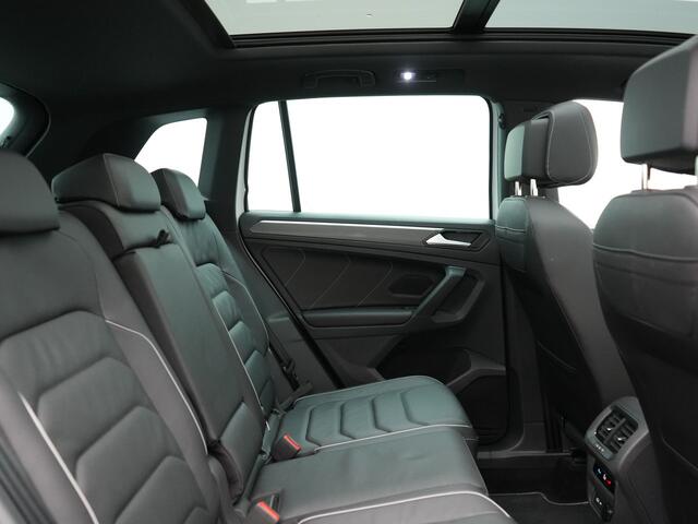 Volkswagen TIGUAN 1.4 TSI eHybrid R-Line Business+ Plug In Hybrid 245pk Dealer O.H. PHEV | Panodak | Adaptive Cruise | 360 Camera | IQ Light | Lederen Stoelen Memory & Verwarmd | Apple Carplay | Stuur Verwarmd | Sfeerverlichting | Virtual | Navigatie | Blis | DAB |