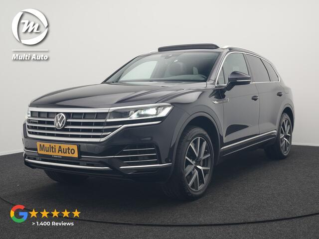 Volkswagen TOUAREG 3.0 TSi eHybrid 4MOTION Plug In Hybrid 381pk Dealer O.H PHEV | Trekhaak Af Fabriek | Lederen Sportstoelen Massage & Memory | Panodak | Adaptive Cruise | Stoelventilatie | Stoelen & Stuur Verwarmd | Blis | Keyless | Apple Carplay | Navigatie | DAB