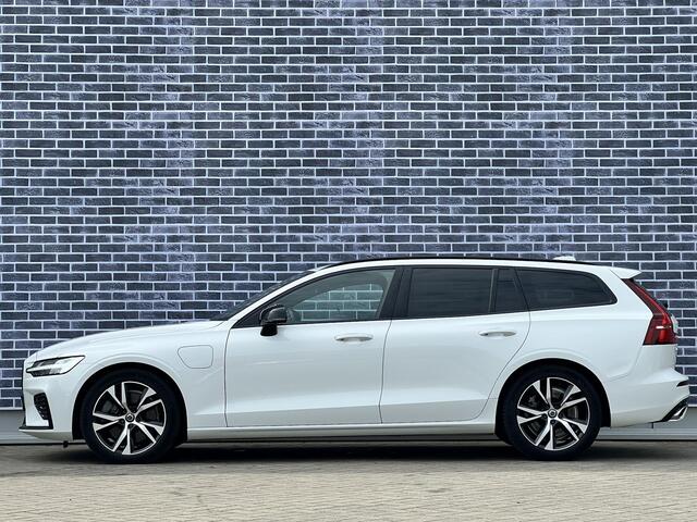 Volvo V60 2.0 T6 Recharge AWD R-Design | Stoel- en stuurwielverwarming | Navigatie | Achteruitrijcamera | Apple Carplay / Android Auto | DAB+ radio | Keyless | LED koplampen | Sportstoelen | Elektrische stoelverstelling |