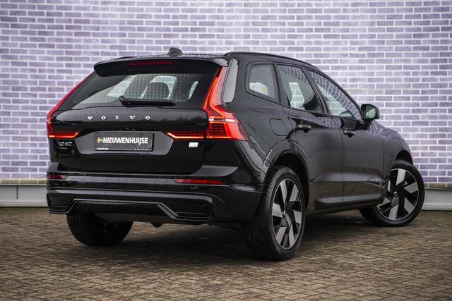 Volvo XC60 2.0 T6 Plug-in hybrid AWD Ultra Dark | Trekhaak | Adaptive cruise control | Head-up display | Harman/Kardon audio | Dode hoek detectie BLIS | Stoelverwarming voor + achter | Stuurverwarming | Elektrische stoelverstelling |