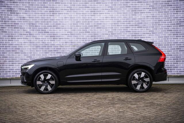 Volvo XC60 2.0 T6 Plug-in hybrid AWD Ultra Dark | Trekhaak | Adaptive cruise control | Head-up display | Harman/Kardon audio | Dode hoek detectie BLIS | Stoelverwarming voor + achter | Stuurverwarming | Elektrische stoelverstelling |