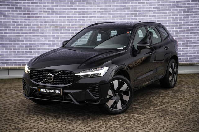 Volvo XC60 2.0 T6 Plug-in hybrid AWD Ultra Dark | Trekhaak | Adaptive cruise control | Head-up display | Harman/Kardon audio | Dode hoek detectie BLIS | Stoelverwarming voor + achter | Stuurverwarming | Elektrische stoelverstelling |